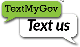 Green and white conversation bubbles with TextMyGov in the green bubble on top and Text us in the wh